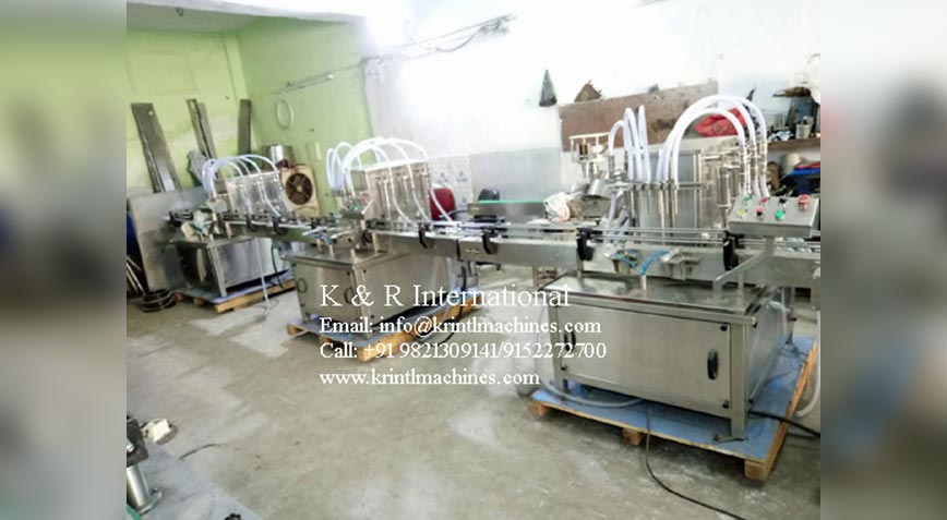 Automatic 6 Nozzle Volumetric Liquid Filling Machine